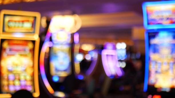 Gem Saviour slot game interface on wild888 mobile app showing colorful gem symbols and spin button
